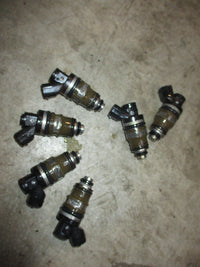Load image into Gallery viewer, Suzuki DT150hp 2 stroke outboard fuel injector set (15710-94900)
