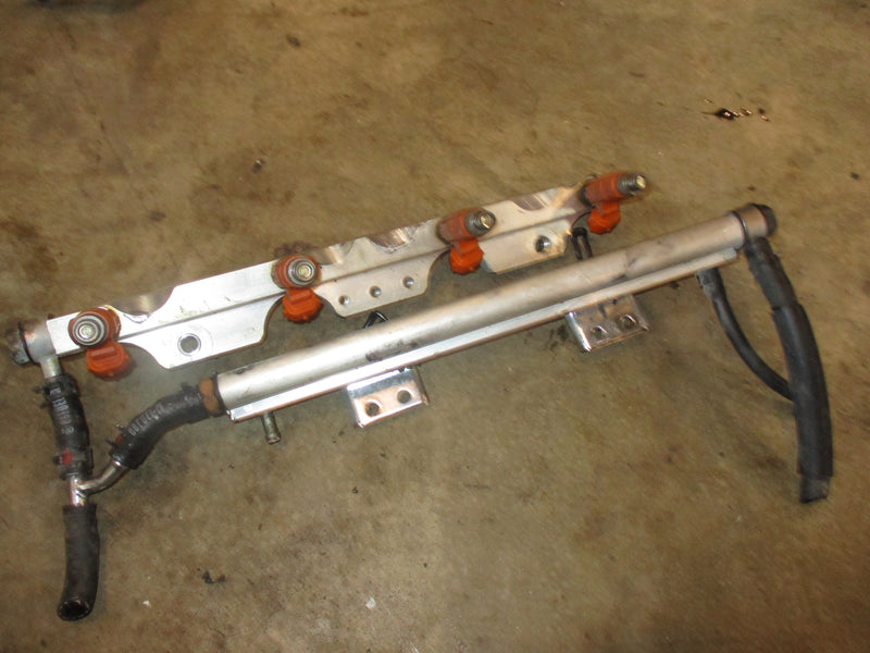 Suzuki DF90 90hp outboard fuel rail and injector set (15710-65D00)