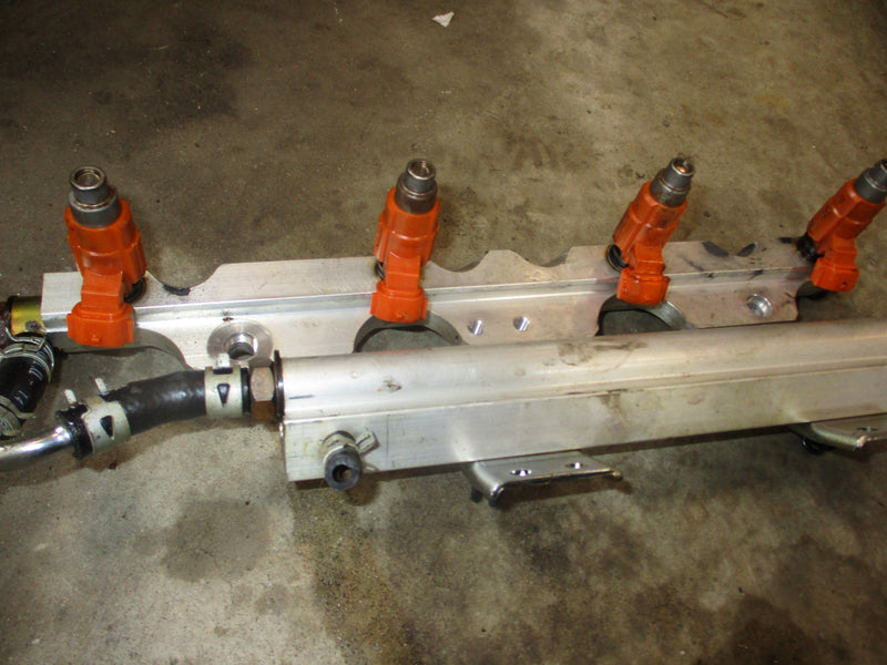 Suzuki DF115 115hp outboard fuel rail and injector (15750-90J00)